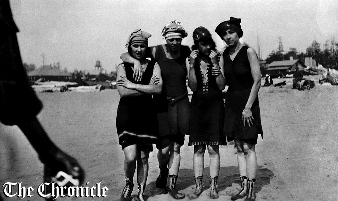 From the news clipping: “BATHING BEAUTIES of 1920 pictured as they invaded Pacific beaches are Mildred Parmonter; Flora Barner, Mildred Miller and Viola Miller. The girls model wool jersey bathing suits considered vogue for that year. - Chronicle Staff Photo.”